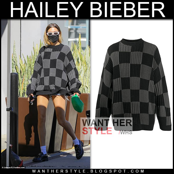 Hailey Bieber in grey checked jumper and black loafers