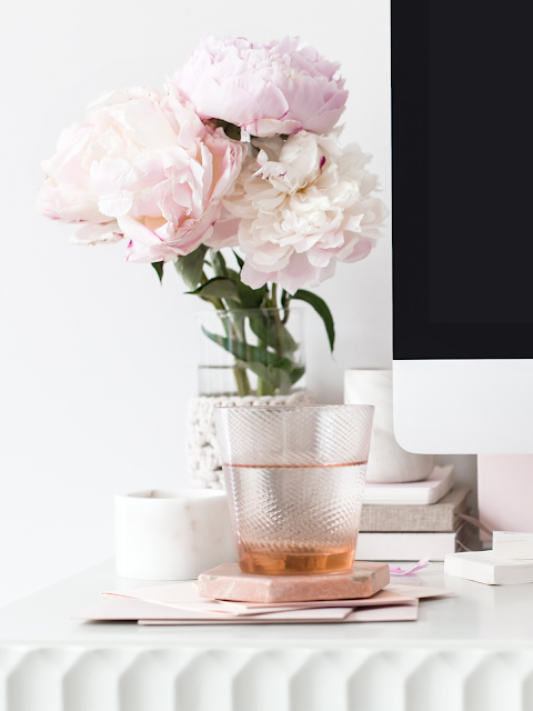 Flowers, a computer screen,