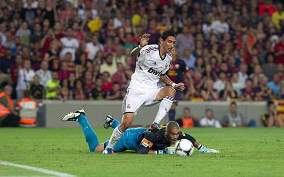 Di Maria takes the ball after Valdes's tragic error and scores for the final score 3-2.