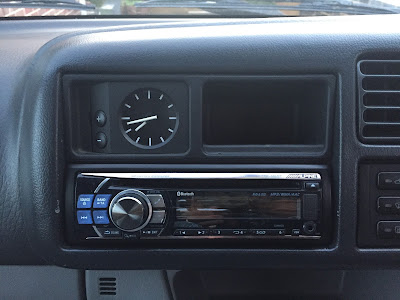 The picture shows the Mazda Bongo dashboard after I had finished fitting the BMW 3 Series clock
