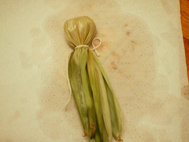 completed corn husk doll head