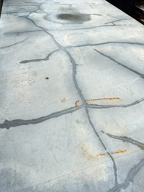 cement with cracks and rust