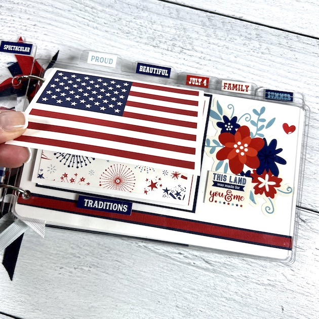 July 4th scrapbook album page with flowers and American flag flip-up card