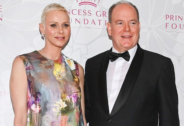 Princess Charlene wore a new Terrence Bray Dress, which featured a beautiful floral design all over the gown. Dior diamond earrings