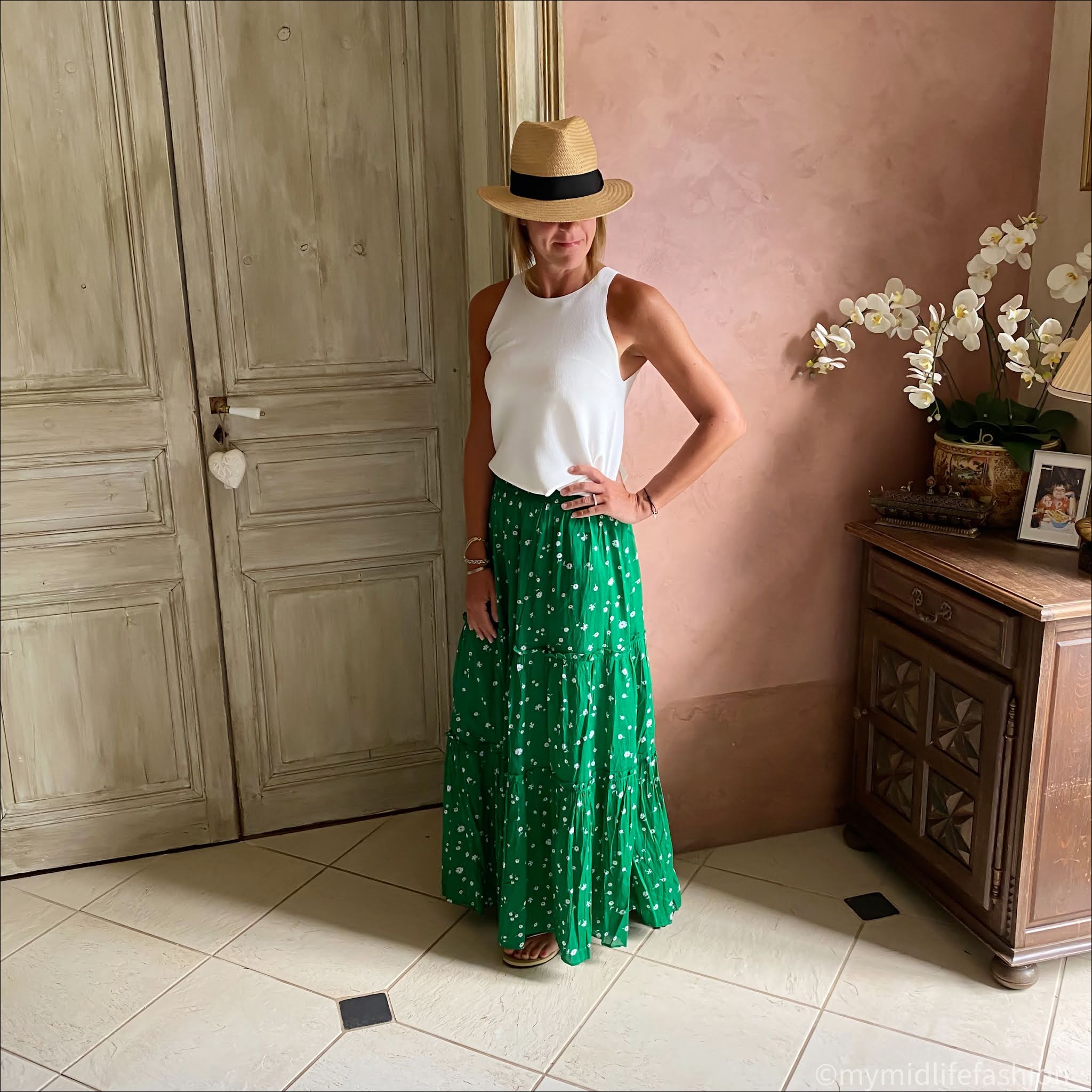 my midlife fashion, whistles green/multi primula print beach skirt, marks and Spencer knitted top, h and m Panama hat, havaianas slim fit gold flip flops