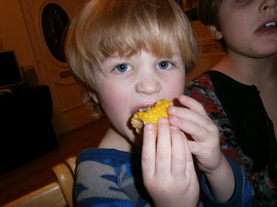 boy eating sweetcorn bites