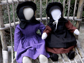 Two Amish dolls