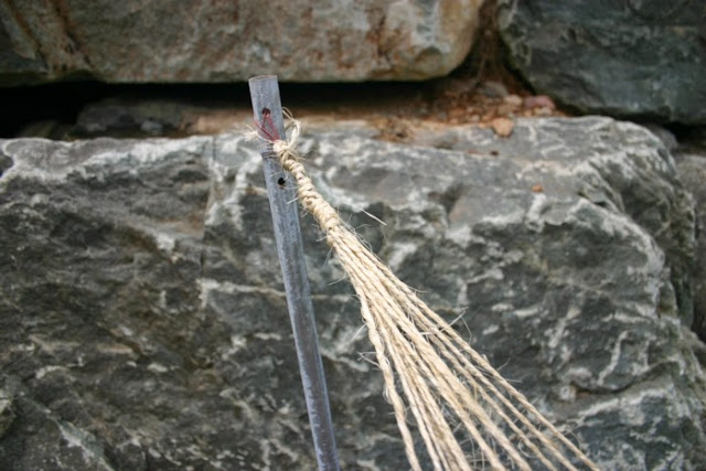 Drilled three holes for covered wire loops  at the top of the conduit pipe.