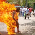 Mob Burns VIO Officer To Death