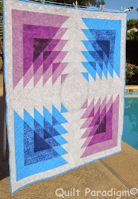 http://quiltparadigm.blogspot.com/2015/04/triangle-transparency-blog-hop-shock.html