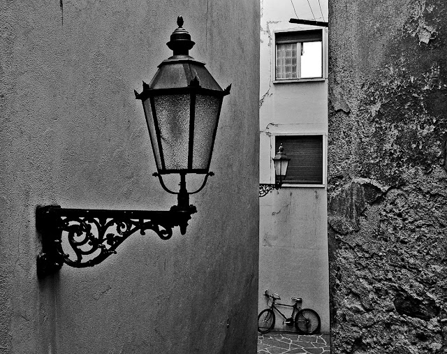 Sion Vallis Old town two lamps and bicycle