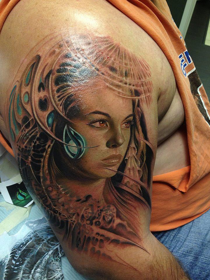 Girl Face Tattoo On Arm