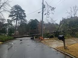 Downed power lines in Georgia after Hurricane Helene causes widespread outages.