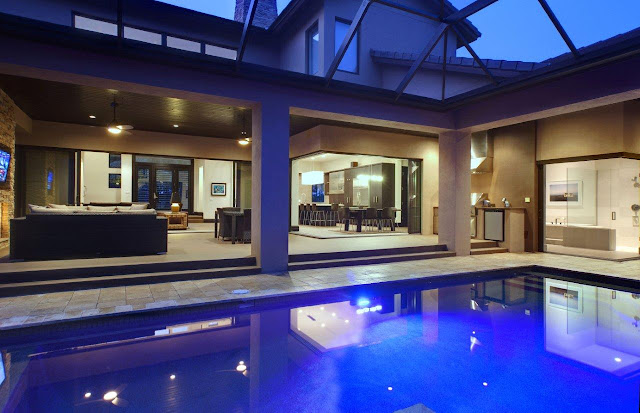 Picture of large swimming pool by the living room