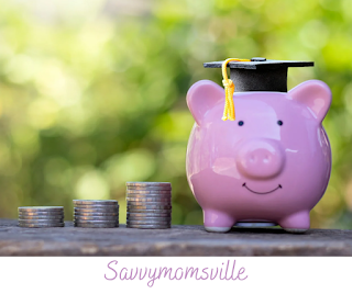 A piggy bank with graduation cap and three rows of coins