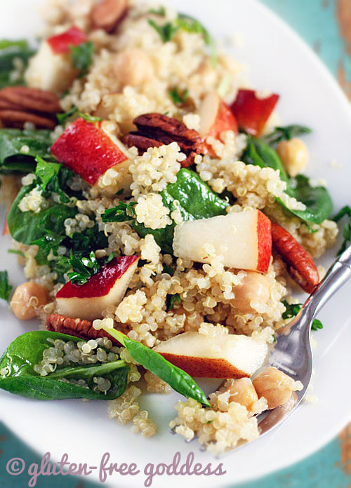 Karina's quinoa salad recipe with baby spinach, pears, and chick peas, with pecans and maple vinaigrette is gluten-free and vegan.