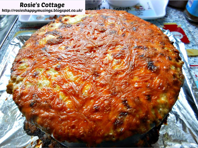 Pasta Bolognese Bake - when cooked carefully remove from oven and allow to sit for a few minutes.