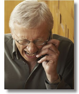 man yelling in phone showing anger at work over some matter