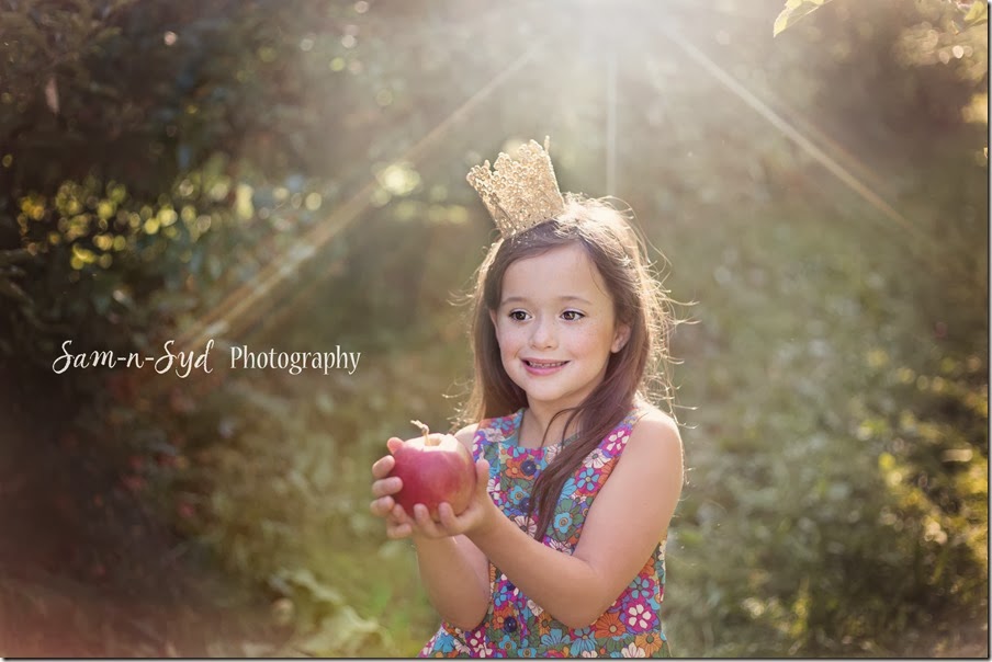 Isa holding apple watermark