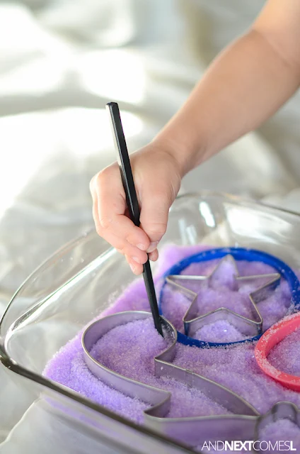 Fine motor sensory activity for kids using lavender scented epsom salt and cookie cutters from And Next Comes L