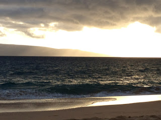 sunset in clouds on ocean