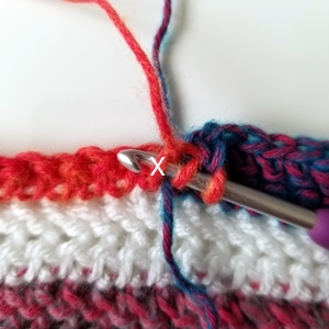 How to make a tidy color change across a row when picking up a new color from below in crochet