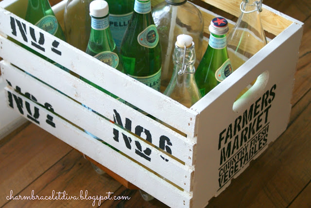 Vintage-inspired rolling pantry cart filled with Pellegrino bottles