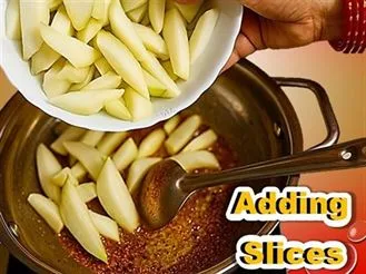 Adding Raw Mangoes Slices for Making Launji