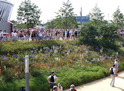But could I award one more goldfor the gardeners at the Olympic Park, . (crowds in olympic park gardens aug )