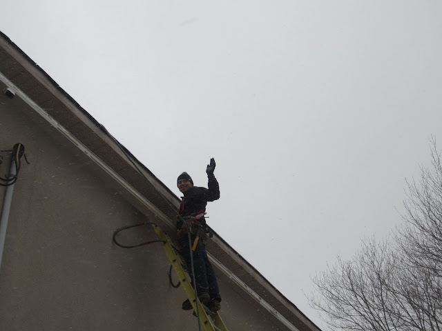 Eavestrough installation in winter Toronto gutter Scarborough