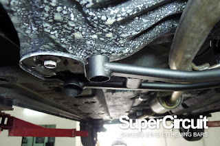 SUPERCIRCUIT Front Lower Brace installed to the Perodua Bezza Chassis