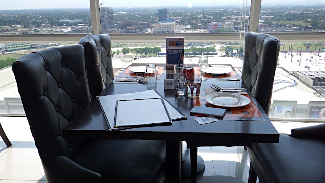 dining table with a view at Injap Tower Hotel Iloilo
