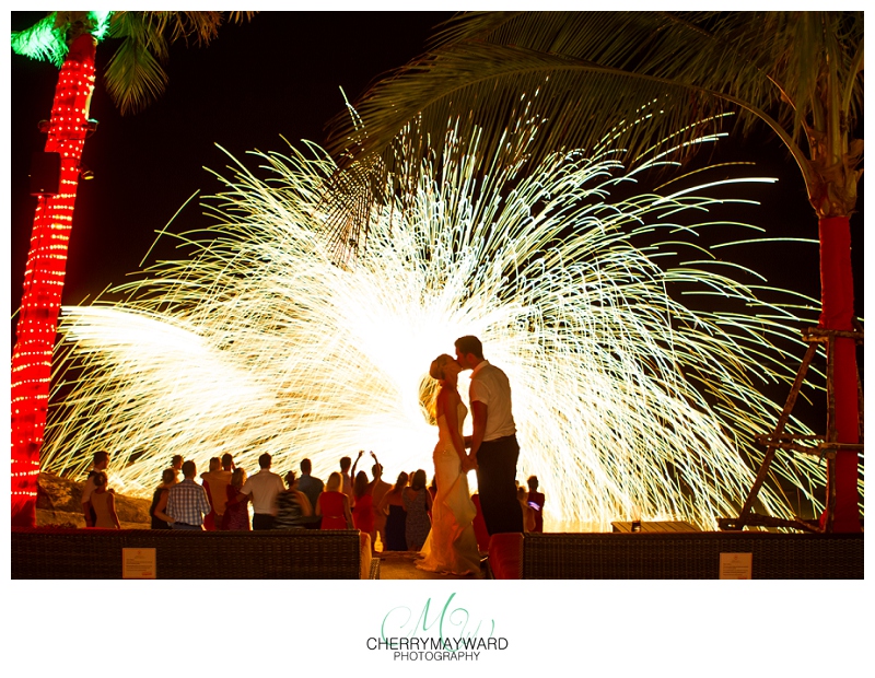 Bride and groom Kiss with firedancer backdrop, stunning photo, beautiful photo, wonderful moment, Bride and groom kiss at night, Koh Samui Wedding, Beach Republic