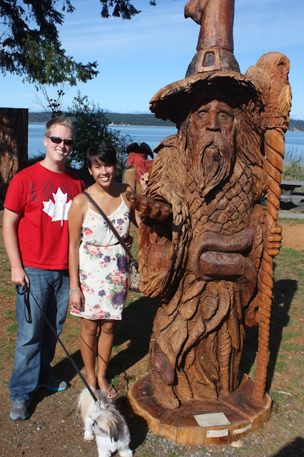 Kristina, Zoey, and husband posing with intricate wizard