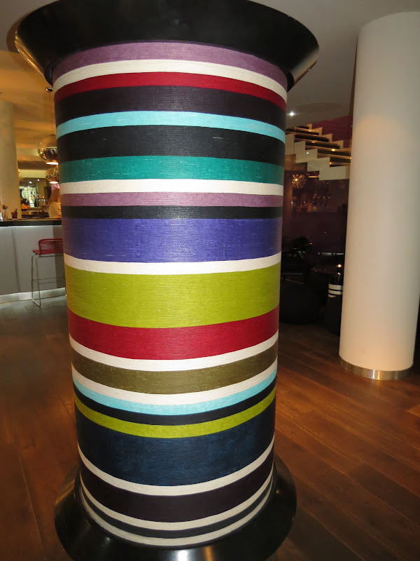 How creative to use spools of thread as large decor items. title=