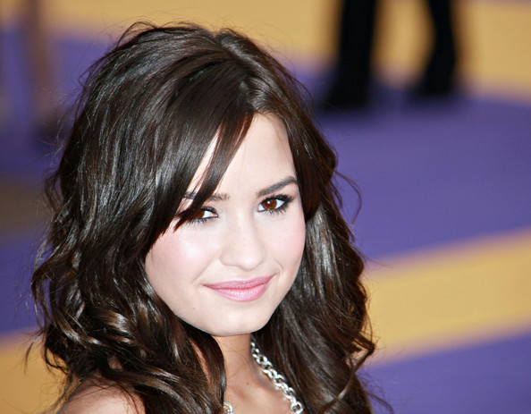 Singer actress Demi Lovato has demi lovato hair up