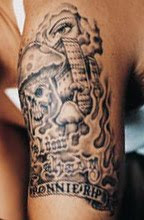Eminem's left arm tattoo
