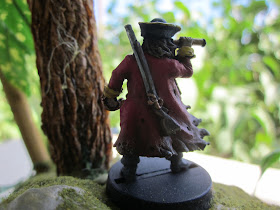 Captain or Privateer, Diamond Joe looks out at the ocean from the jungle.