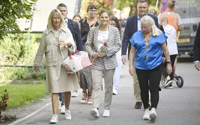 Crown Princess Victoria wore a grey checkered Karah blazer from By Malina. Filippa K white cotton top and beige trousers