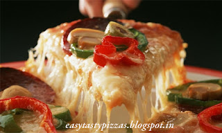 easy tasty pizzas - Baked Spaghetti Pizza