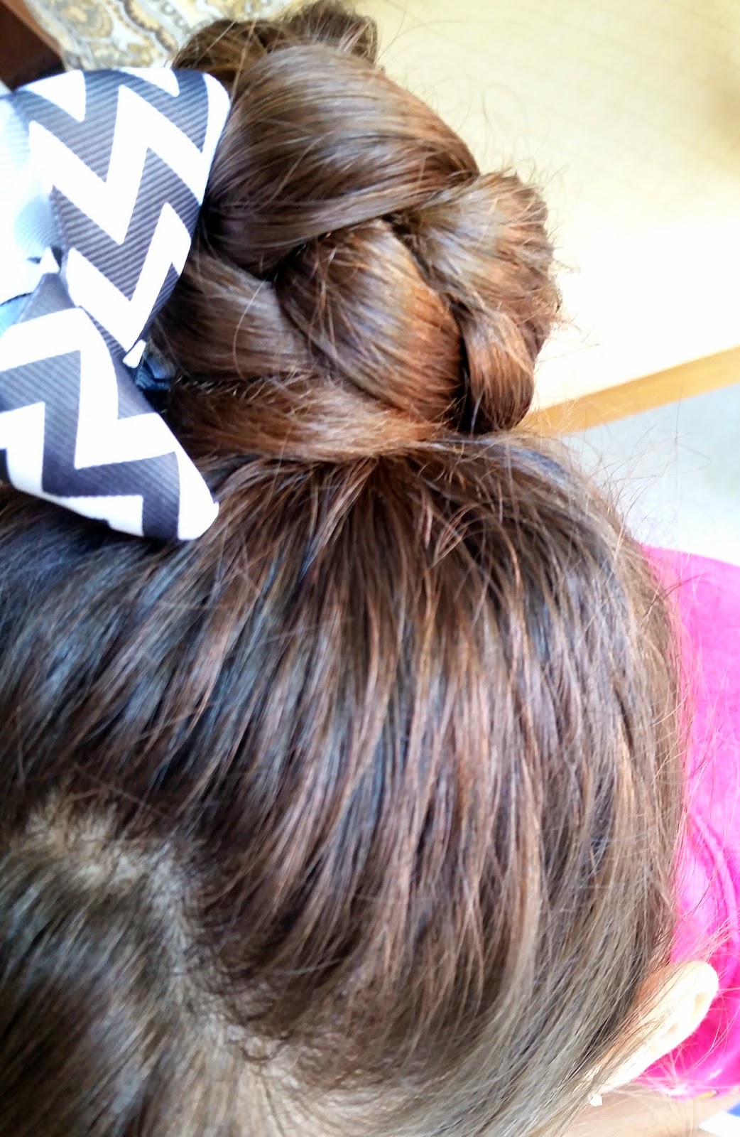 The Cord Knot Bun Is About to Be Your Go-To Summer Hairstyle | Glamour