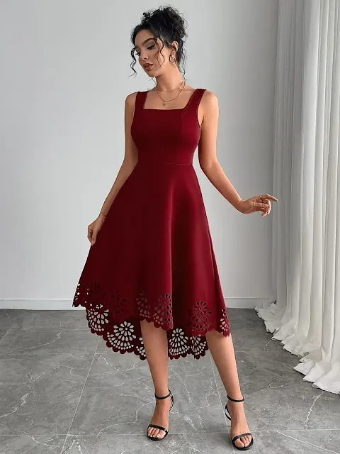 Woman wearing an Elegant Burgundy Sleeveless Midi Dress