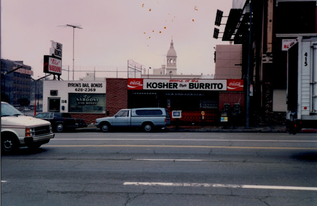 Shop with a sign saying "Kosher Burritos"