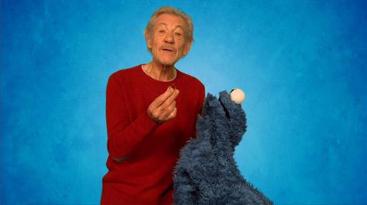 Sesame Street Episode 4513. Ian McKellen and Cookie Monster introduce the word of the day, resist.