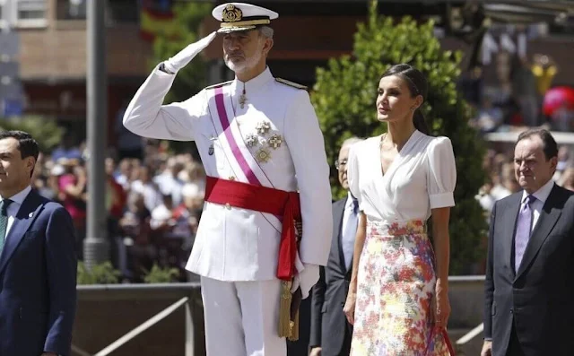 Queen letizia wore a new floral print midi skirt by Jose Hidalgo, and a white silk blouse Jose Hidalgo