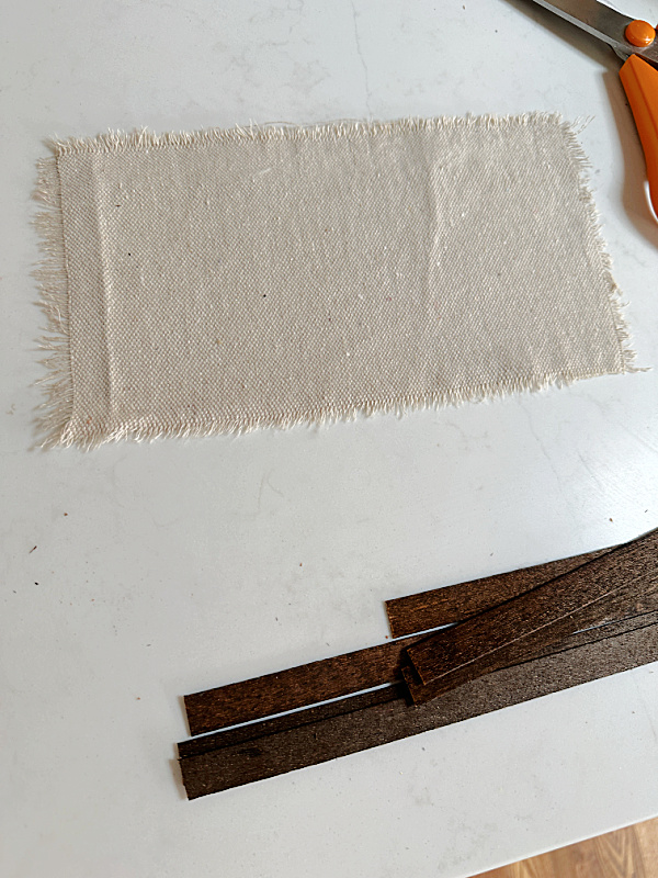 frayed muslin rectangle of fabric