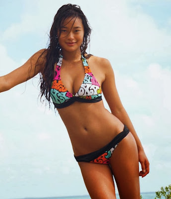 American model of Hawaiian and Asian descent, Jarah Mariano looks hot while posing for model of collection of Roxy sexy swimwear