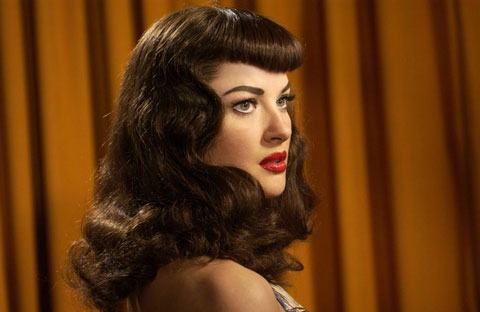 This hairstyle is an ultra retro throwback reminiscent of that famous pin-up