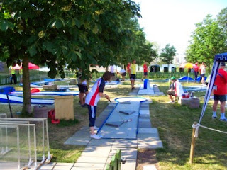 Emily playing the Eternit Miniaturegolf course in Stockholm, Sweden