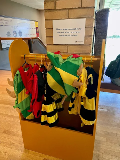 a small rack of dressing up clothes for toddlers and preschoolers at Chelmsford museum